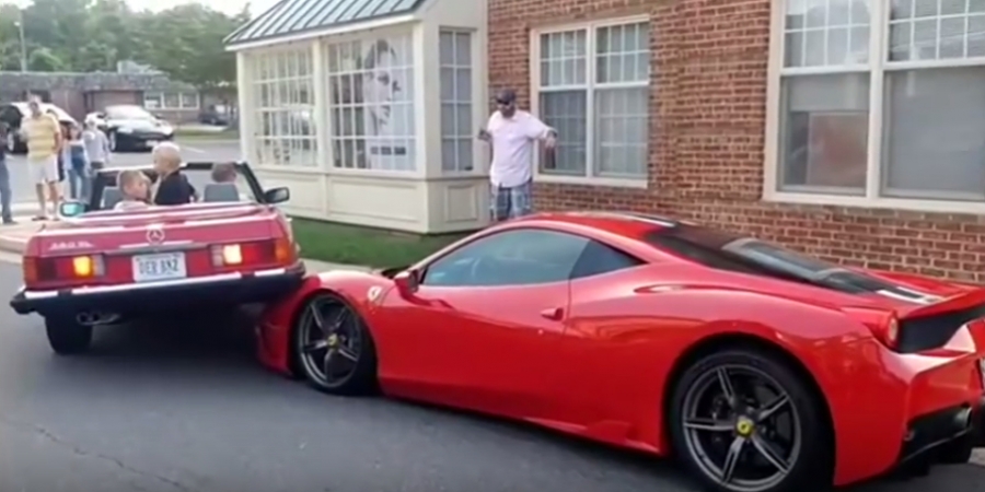 Silly bitch backs into a rare 200k Ferrari while trying to park article image
