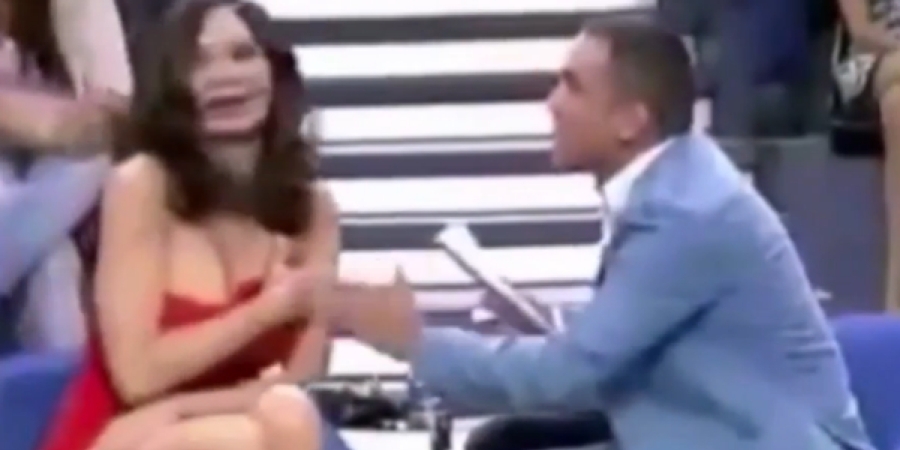 Woman storms off stage after presenter exposes her boobs on live TV article image