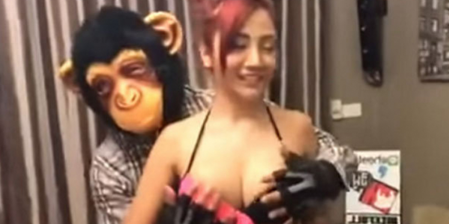 Thai pornstar faces jail over 'monkey mask' sex act video article image