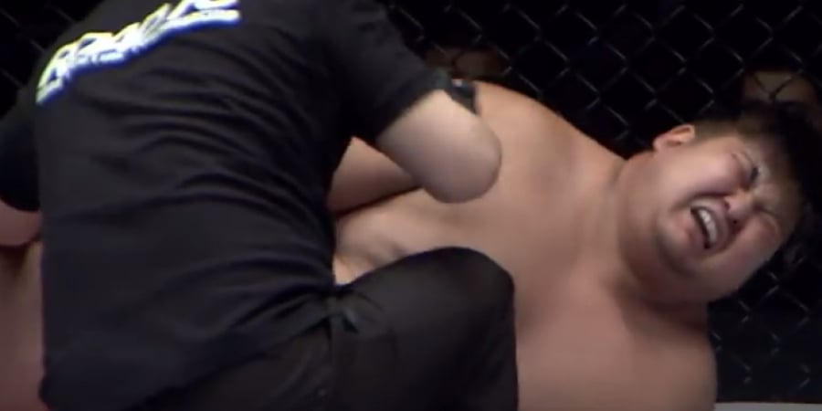 MMA fighter sobs after being kicked in the dick article image