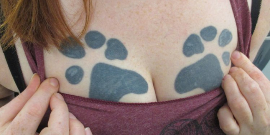 Girl with paw prints tattoed on her boobs is sick of being called 'paw t*ts' article image