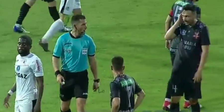 Romanian ref gives player a facial article image