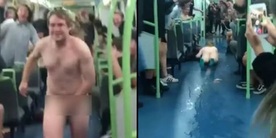 Naked dude slides down middle of packed train carriage article image