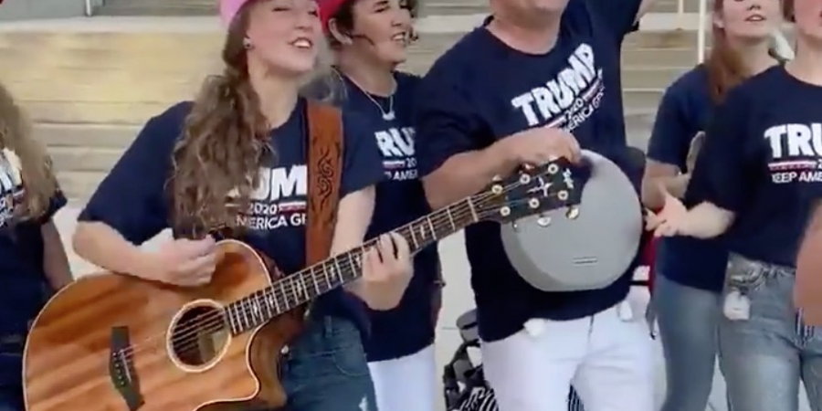 Trump supporters assault the ears of passers-by with cringe song ahead of election article image